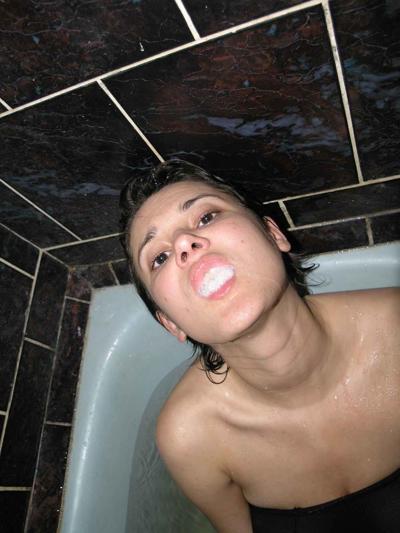 15P Homemade pix of busty amateur facialed in bathtub