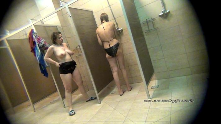 12P Two women share a tiny public bathroom