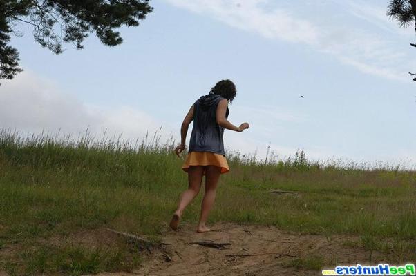 16P Chick strips completely naked and pees in the sand