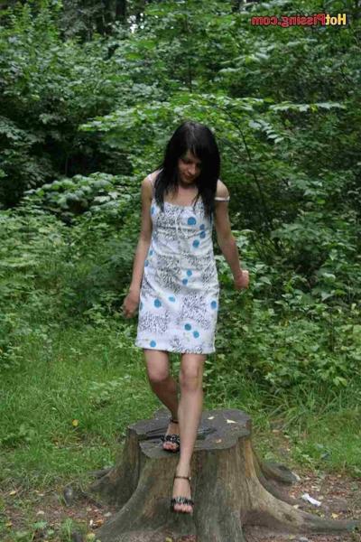 15P Sexy slut pissing outdoors