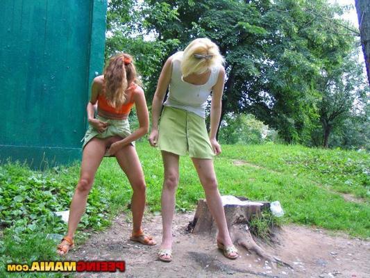 11P Raised green mini skirts of two bimbos who want to do a leak outdoors