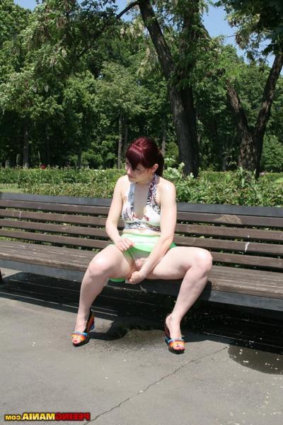 11P Total bitch spreads her legs wide and pees thru panties on the bench