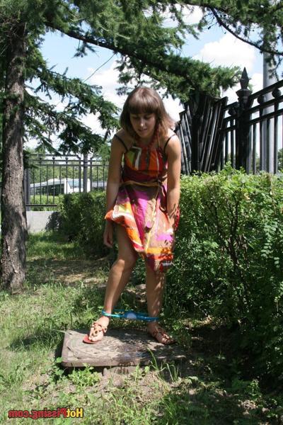 15P Shy angel in a colorful dress squats in the bushes to have a pee-pee