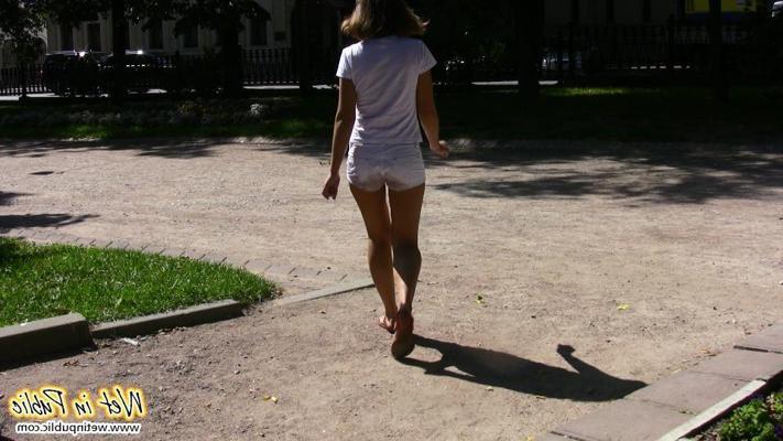 15P Public pissing shame of a babe in the white shorts and her nude pussy