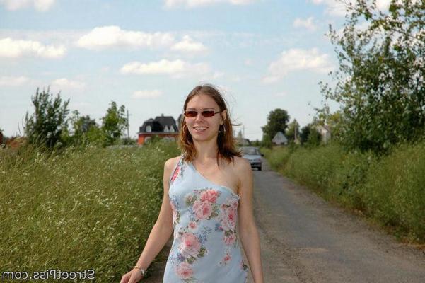 12P Hot chick in high heels squats down on a country road