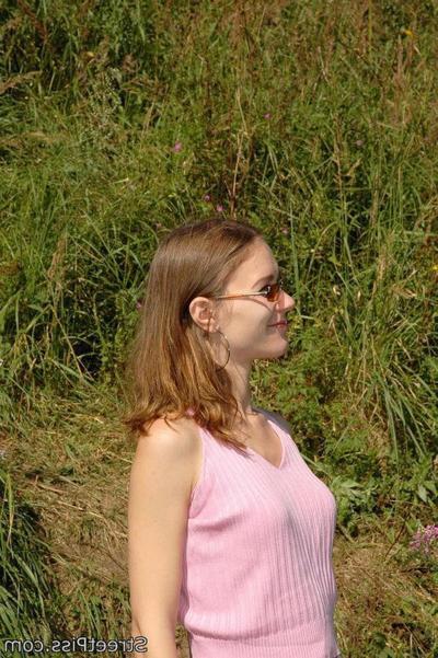 12P Leggy young hottie parades pee play on a bank