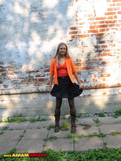 15P Beautiful girl with black skirt toilets somewhere on the open road