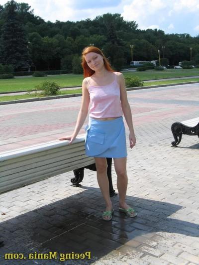 15P Playful babe empties her bladder sitting on the bench back in the park
