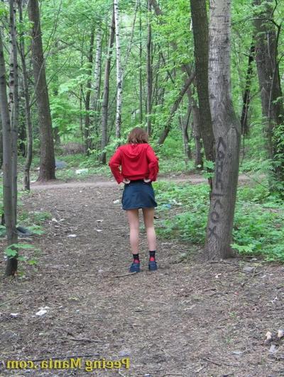 15P Dark-haired girl doing a pee-pee gets caught on spy camera in the park