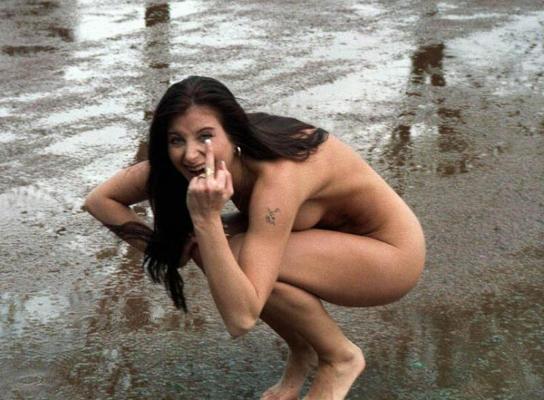 20P Busty gal walks nude at parking lot