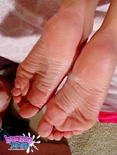 15P tasty babe gives footjob for cummy feet
