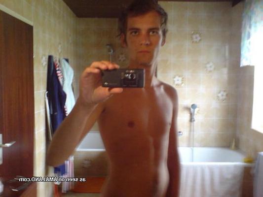 15P Horny twink stroking his cock in the toilet