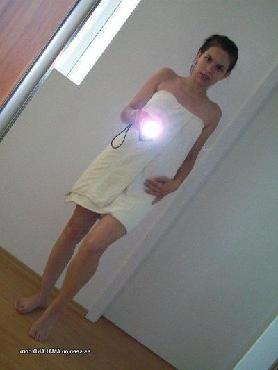 10P Sexy Spanish babe stripping naked for the cam