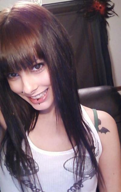 16P Photos of a dark-haired hottie who likes to tease the camera