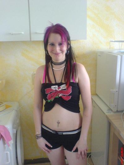 16P Photos of a big-tittied chick in her sexy poses
