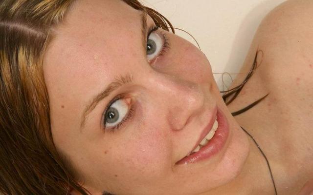 15P babe washing her hairy pussy in shower