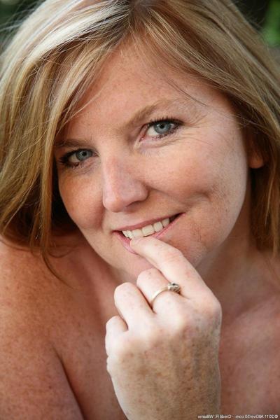 15P Horny amateur mature strips naked outside