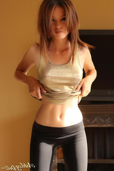 15P Ashley Doll in tight black yoga pants stripping nude