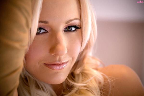 15P Glamour babe in white stockings Cody Love spreads her pussy lips wide
