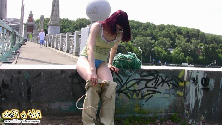 12P Red-haired gal wets her pants and takes a pissing tour around the city