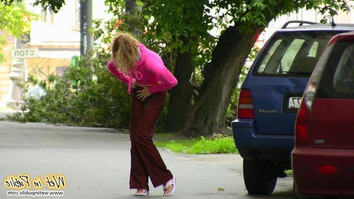12P Real outdoor pissing trouble of a confused babe in the crimson pants