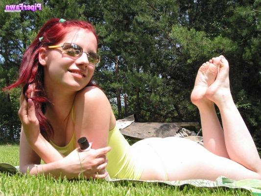 16P Busty redhead teen wearing sunglasses outdoors