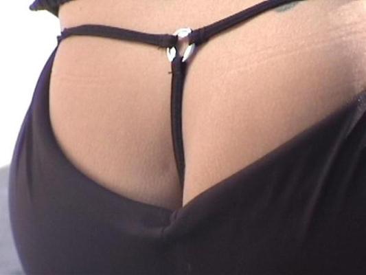 16P Tiny black thongs showing in public