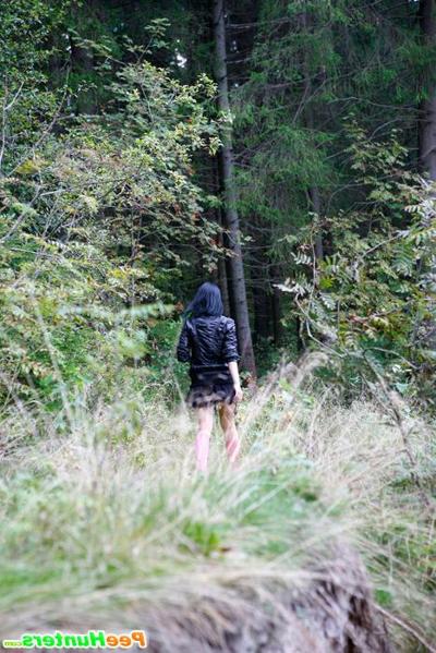 16P Naughty brunette tart takes a leak in the woods