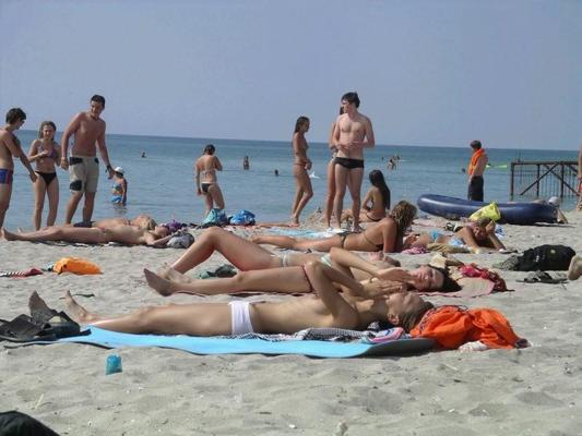 12P Nudists having fun on the beach