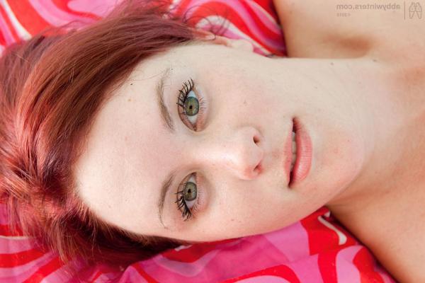 15P Perky redhead amateur teen toying her pussy