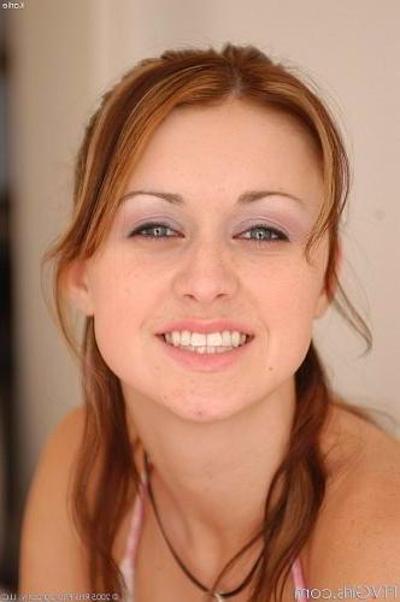 22P Redhead coed lifting skirt spreads wet lips