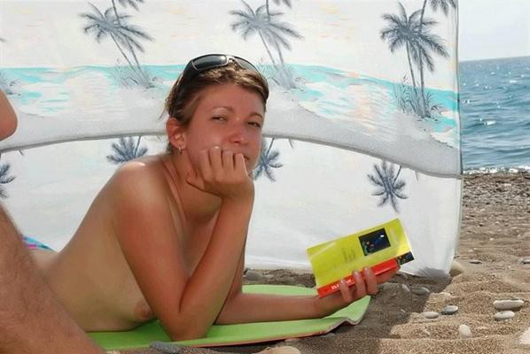 12P Nude nudists relaxing on the beach