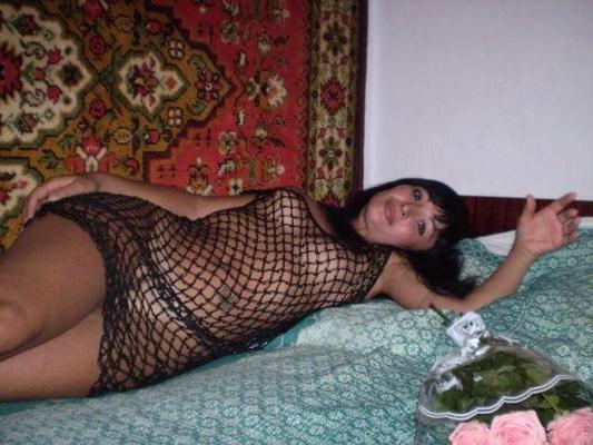 13P Young woman strips naked