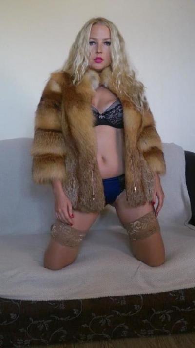 6P Blonde Russian posing on couch in shiny tan stockings