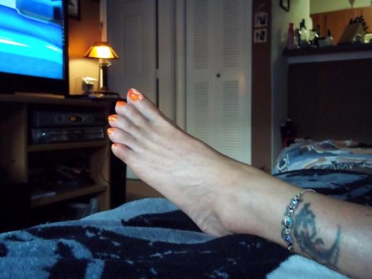 15P Chance's long tan legs and neon orange toes