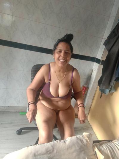 23P Mature woman bathing